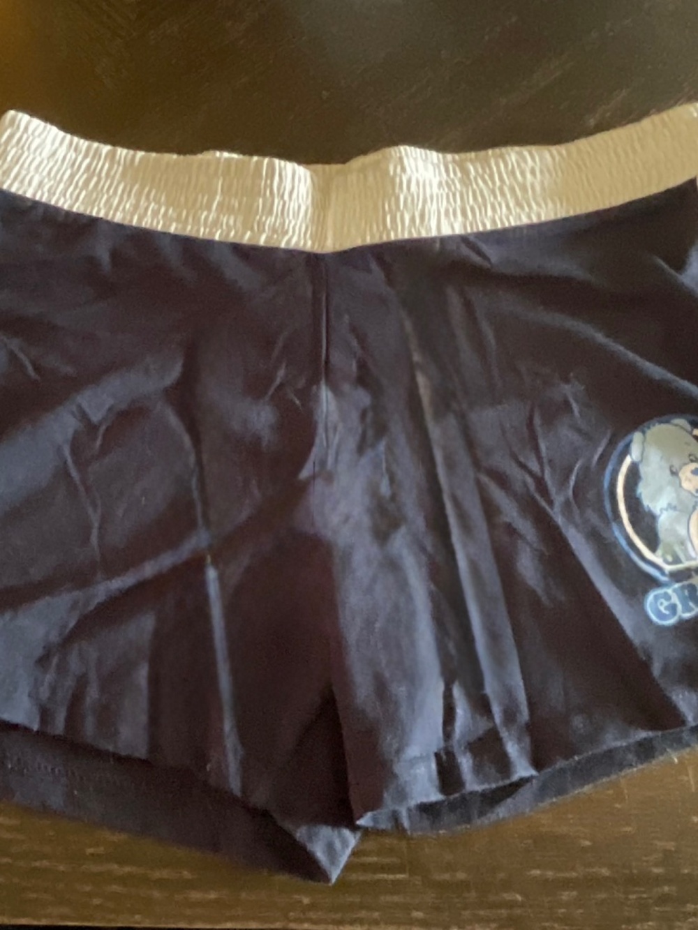 SHORTS BY ‘CAREBEAR ‘’ ..’’GRUMPY ‘’ ON BACK ..RETIRED size  XL